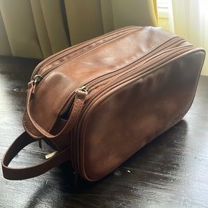 Elviros Travel Bag for toiletries. NWOT. Soft brown leather. Very nice!